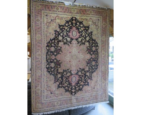 A hand knotted Tabriz carpet - 195cm x 154cm - 500 knots per square inch - in good condition 