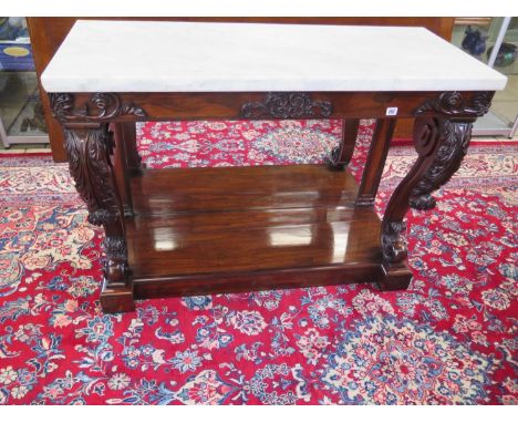 A very fine Regency rosewood console table with a marble top in the manner of Gillows in good condition, replaced back board 