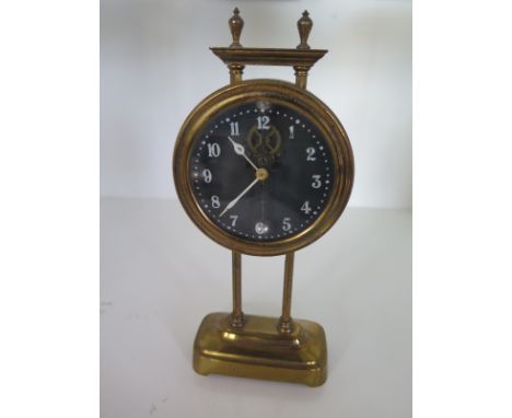 A brass gravity action mantle clock - Height 25cm - not working 