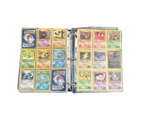 Folder Containing Base set, Jungle, Fossil Pokemon Cards. Including early Japanese Pocket Monster cards. All sets not complet
