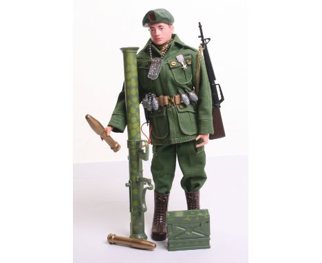 Palitoy vintage Action Man Soldiers of The Century Green Beret on red painted head fixed hands doll, fatigue jacket and trous