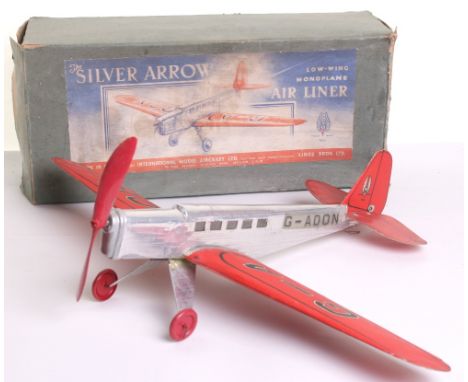 Scarce Frog ‘The Silver Arrow’ Low Wing Monoplane Air liner, aluminium fuselage, with red wings, registration G-A DON, Frog t