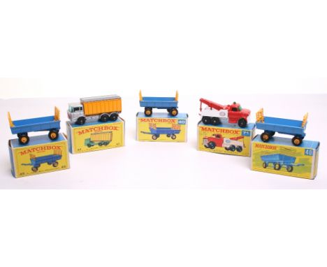 Five Matchbox Regular Wheels Boxed Models,3 x 40c Hay Trailers, in 3 types of boxes, 47c Daf Tipper container Truck and 71c F