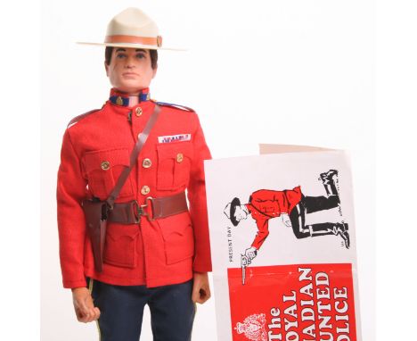 Palitoy vintage Action Man Royal Canadian Mounted Police on brown flocked hair,gripping hands doll, jacket, trousers, belt an