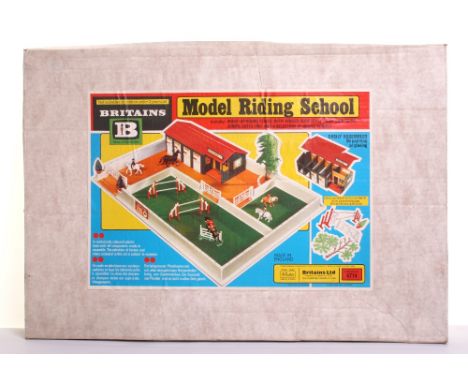 Britains Boxed 4714 Model Riding School, includes make up riding stable with hinged roof, stalls and tack room, jumps, gates,
