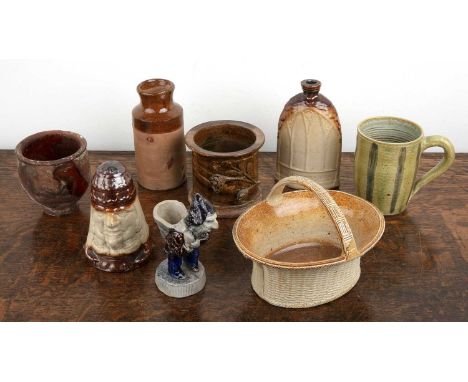 Group of stoneware and pottery pieces19th Century and later, including a two-sided mask cup, 13cm high, a Gothic style flask 