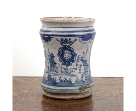 Blue and white pottery albarelloItalian, Naples, 18th Century, painted in blue with a campanile, churches, and an oval cartou