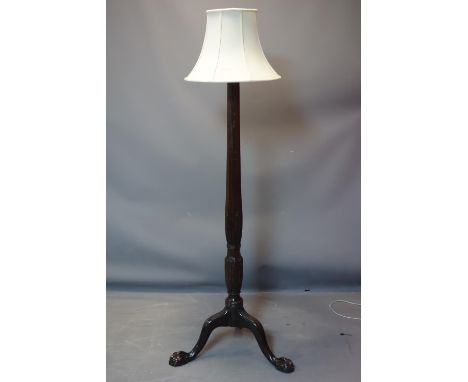A Regency style mahogany standard lamp, with reeded and floral support on ball and claw feet, H.170cm 