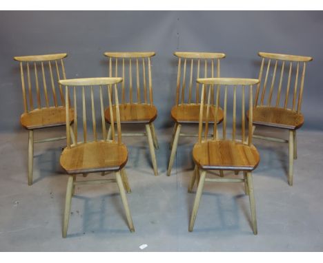 A set of six Ercol dining chairs 
