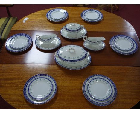 An early 20th century Royal Doulton dinner service, comprising 1 large tureen, 1 smaller tureen, 2 gravy boats, 1 ladle, 6 la