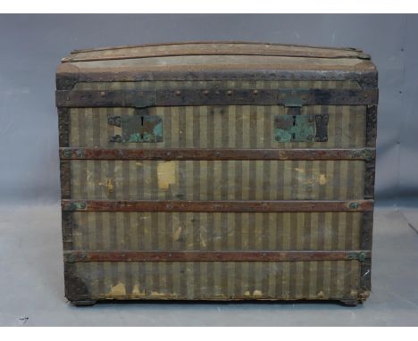 A large Victorian domed top iron bound shipping trunk, H.69 W.80 D.53cm 