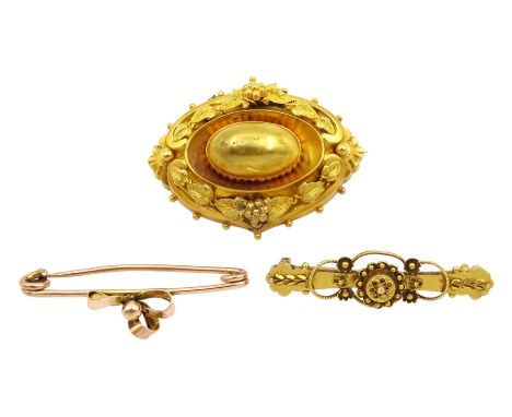 Victorian gold oval mourning brooch, 15ct gold bar brooch and a 9ct gold bow bar brooch