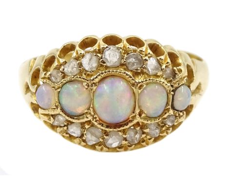 Early 20th century five stone graduating opal ring, with diamond surround, stamped 18ct