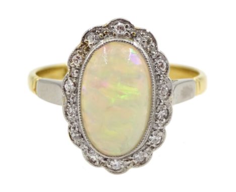 Gold oval opal and diamond, milgrain set cluster ring, makers mark B.K.T, stamped 18ct &amp; Plat