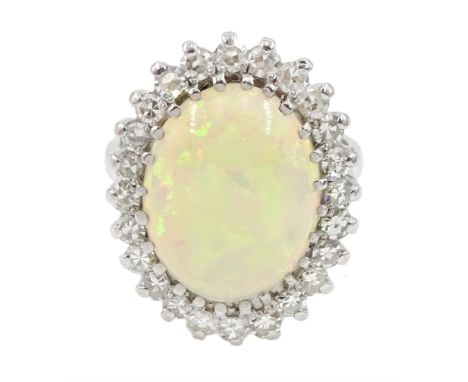 White gold oval opal and diamond cluster ring, stamped 18ct, total diamond weight approx 1.00 carat