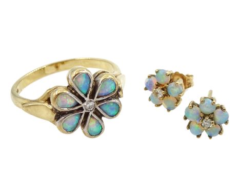 Gold opal and diamond flower design ring and pair of matching earrings, both hallmarked 9ct