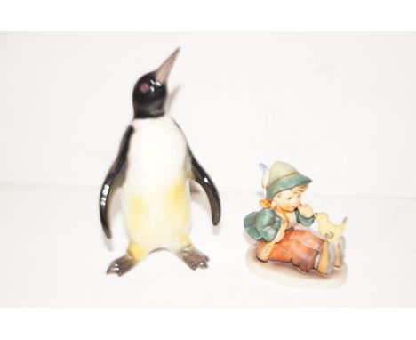 West German figure of a penguin together with a Goebel figure height 15 cm