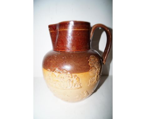 Doulton Lambeth stoneware jug with hunting scene decoration Height 19 cm 
