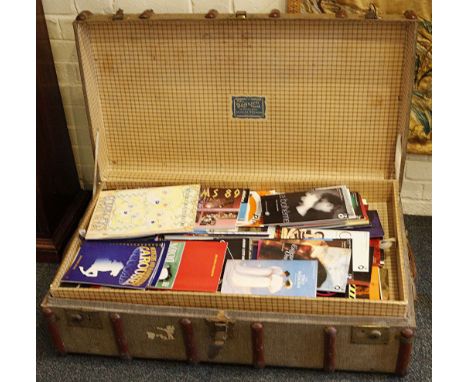 A steel bound burlap 'Drawco' trunk with two tiers of storage filled to capacity with theatre programmes. (Qty).