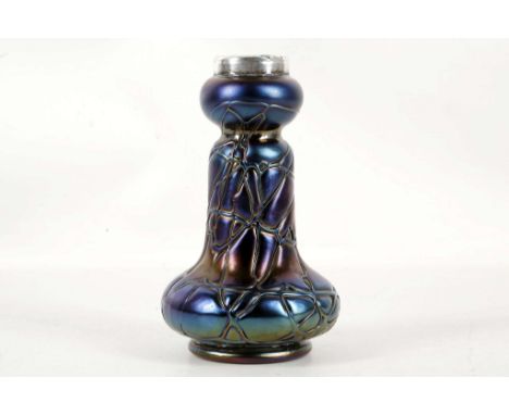 An Austrian Bohemian Palme K&ouml;nig Jugenstil period iridescent small art glass, splashed with silvery dark blue iridescent