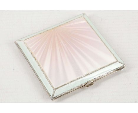 An Art Deco Mappin &amp; Webb, hallmarked silver ladies cocktail compact, having light pink enamel cover. Birmingham 1937.