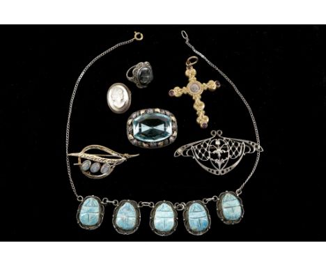 An interesting collection of Victorian and later jewellery to include; a gilt metal cross with hair momento in centre and set