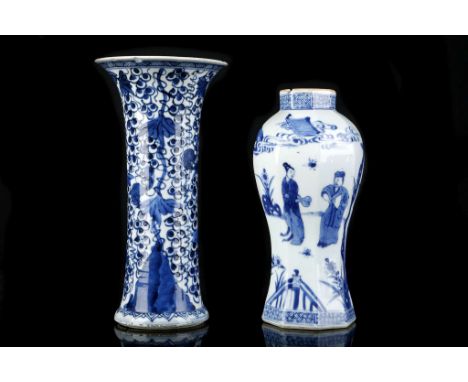 TWO CHINESE BLUE AND WHITE VASES. Qing Dynasty, Kangxi era and 19th Century. The first of octagonal section painted with a fi