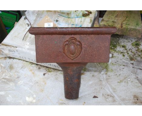 A cast iron rain hopper, 12 1/2" wide x 6" x 5 1/2".