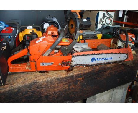 A Husqvarna 61 chainsaw, good compression, 18" cutter bar.