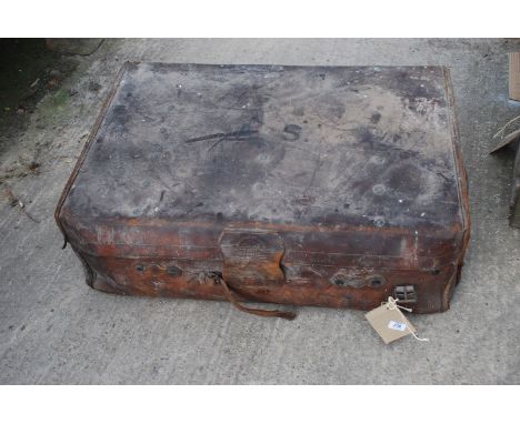 A large leather trunk, John Pound &amp; Co. with crest.