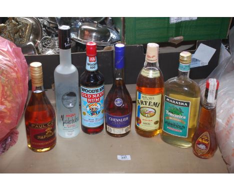Six bottles of spirits to include Tchaikovsky Polish Vodka 40%, Wood Old Navy Rum, Artemi Honey Rum and Chevalier Cognac.