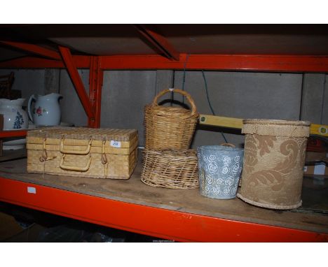 A picnic hamper without contents plus others.