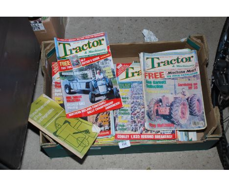 A box of tractor and machinery books.