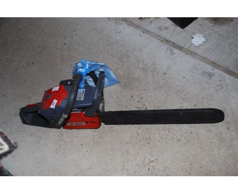 An Efco MTH 560 chainsaw, good compression with chain break plus booklet.