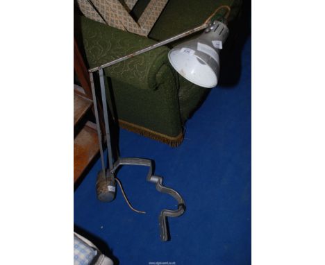 An adjustable pillar mounted lamp.