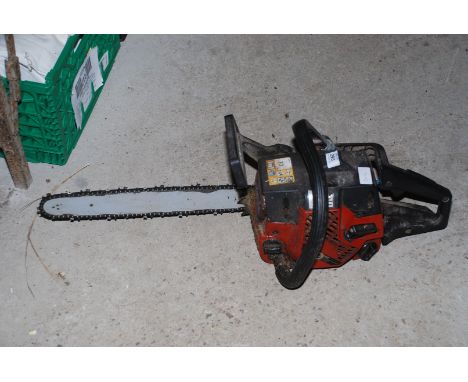 A Jonsered chainsaw, chain break, good compression.