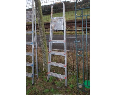 A five rung aluminium step ladder.