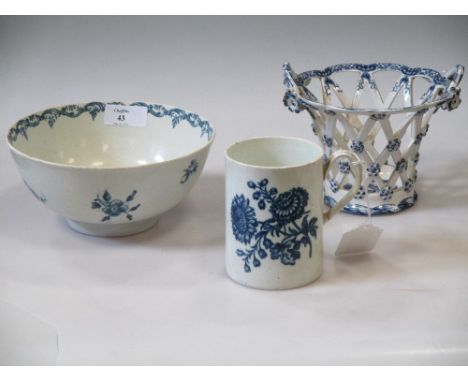 An 18th century Worcester blue and white mug, a bowl and a later basket  
