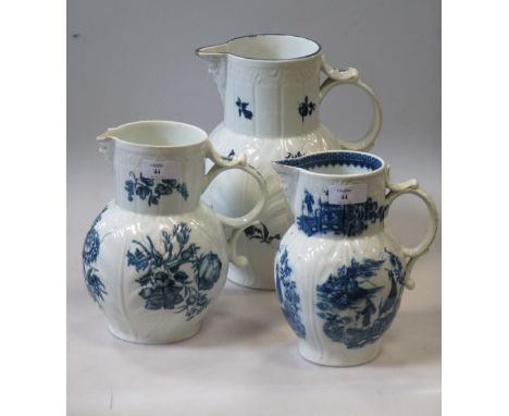 Two Worcester and a Caughley blue and white mask jug  