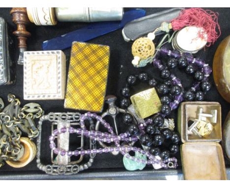 A box of small collectibles, including snuff boxes  
