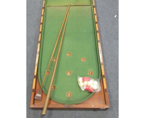 A late Victorian mahogany cased table top bagatelle board  