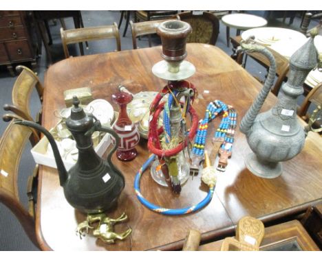 A middle eastern tinned ewer and basin, an enamelled clear glass hookah pipe together with a Bohemian ruby overlay vase, a Yu