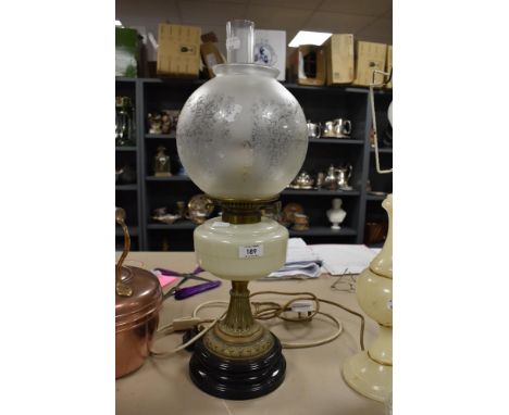 A Victorian brass and glass oil lamp, later converted