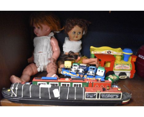A small selection of Corgi and Lledo model vehicles, two composite dolls, two model canal barges and children's toy circus tr