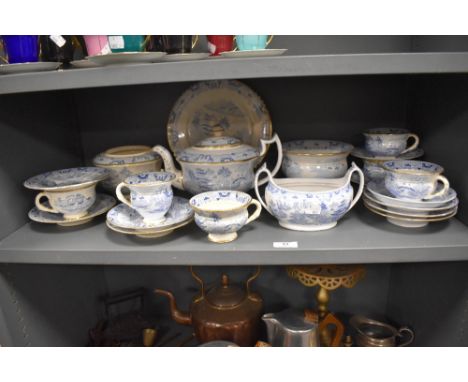 A Victorian porcelain part tea service in a traditional blue and white Willow ware style print