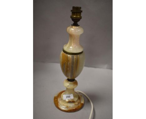 A turned onyx table lamp, of urn form