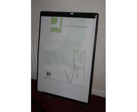 A large white board, with paper clip and easel type stand. 112 cm x 75 cm.  CONDITION REPORT: Some slight warping. Minor mark