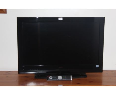 A Hitachi 32 inch flat screen LCD television, complete with power cable and remote control.   CONDITION REPORT: Appears to be