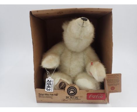 Boyds Coca-Cola Polar Bear, boxed with tag attached, stitch down nose and jointed at limbs. Approx. 35cm (H). UK P&amp;P Grou