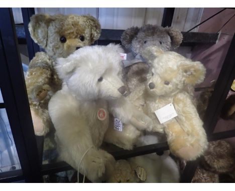 Four mixed teddy bears, including a Steiff Lenard 035401 and a Merrythought Edward Christopher Robin's Teddy Bear. UK P&amp;P